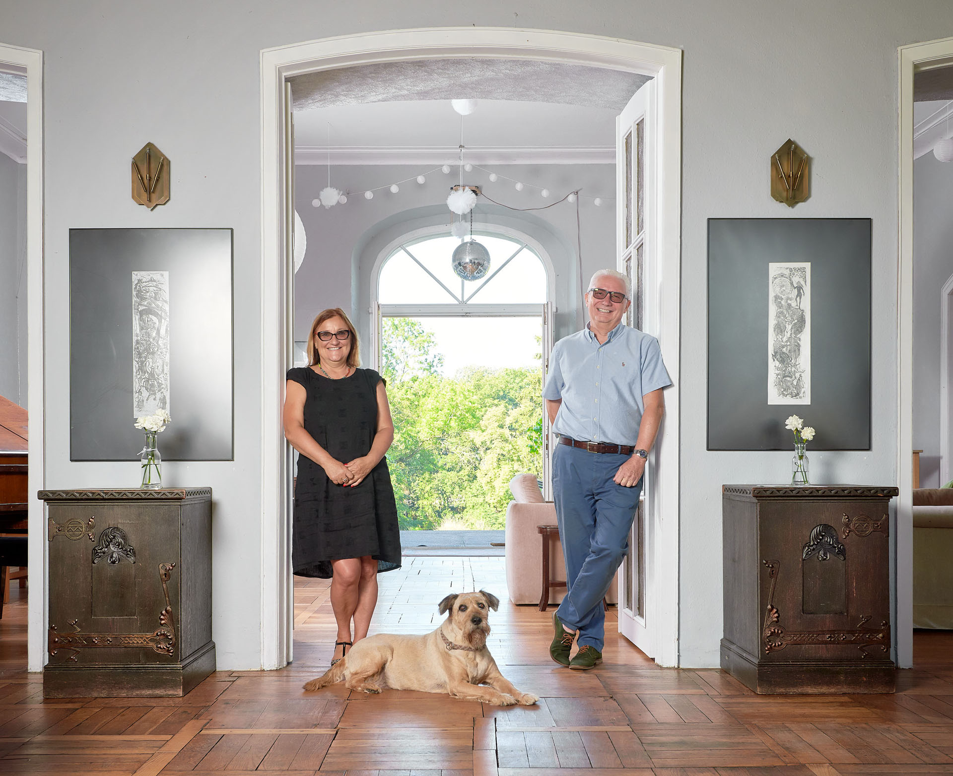 Jolanta Grenke and Edward Orlowski in their manor house in Ramin with their dog.